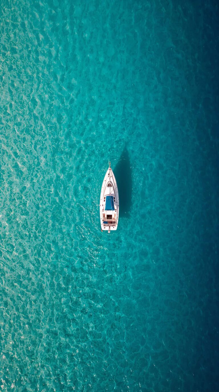summer-adventure-wallpapers-sailboat-turquoise-bay-aerial
